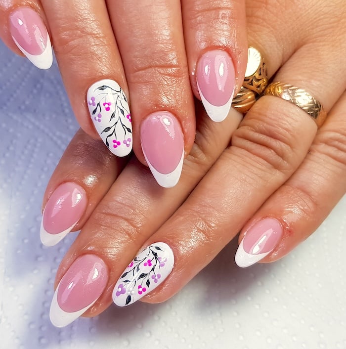 Floral French tip nails.