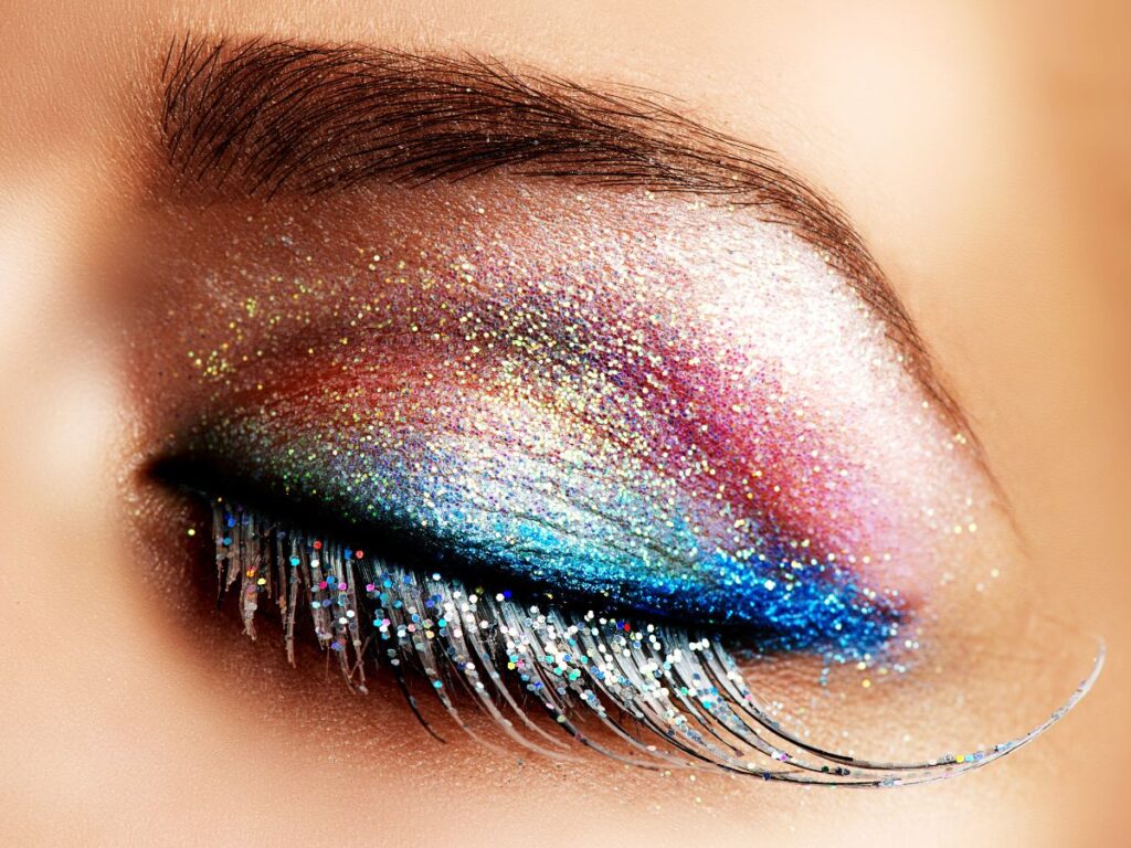 Rainbow glitter eyeshadow look.