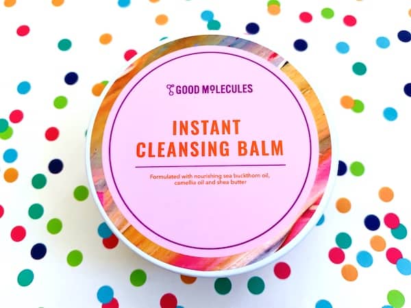 Good Molecules Instant Cleansing Balm on colorful dot background