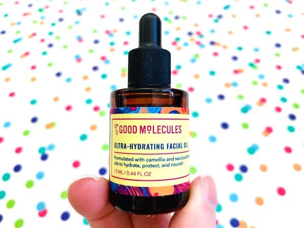 Good Molecules Ultra-Hydrating Facial Oil on colorful dot background