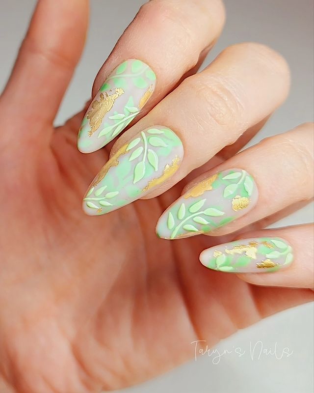 Gold and green floral spring nails.