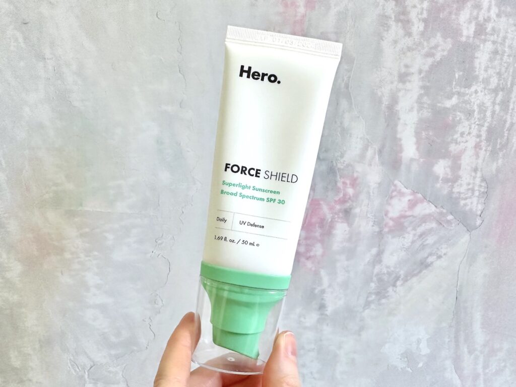 Hero Cosmetics Force Shield Superlight Sunscreen Broad Spectrum SPF 30, handheld.