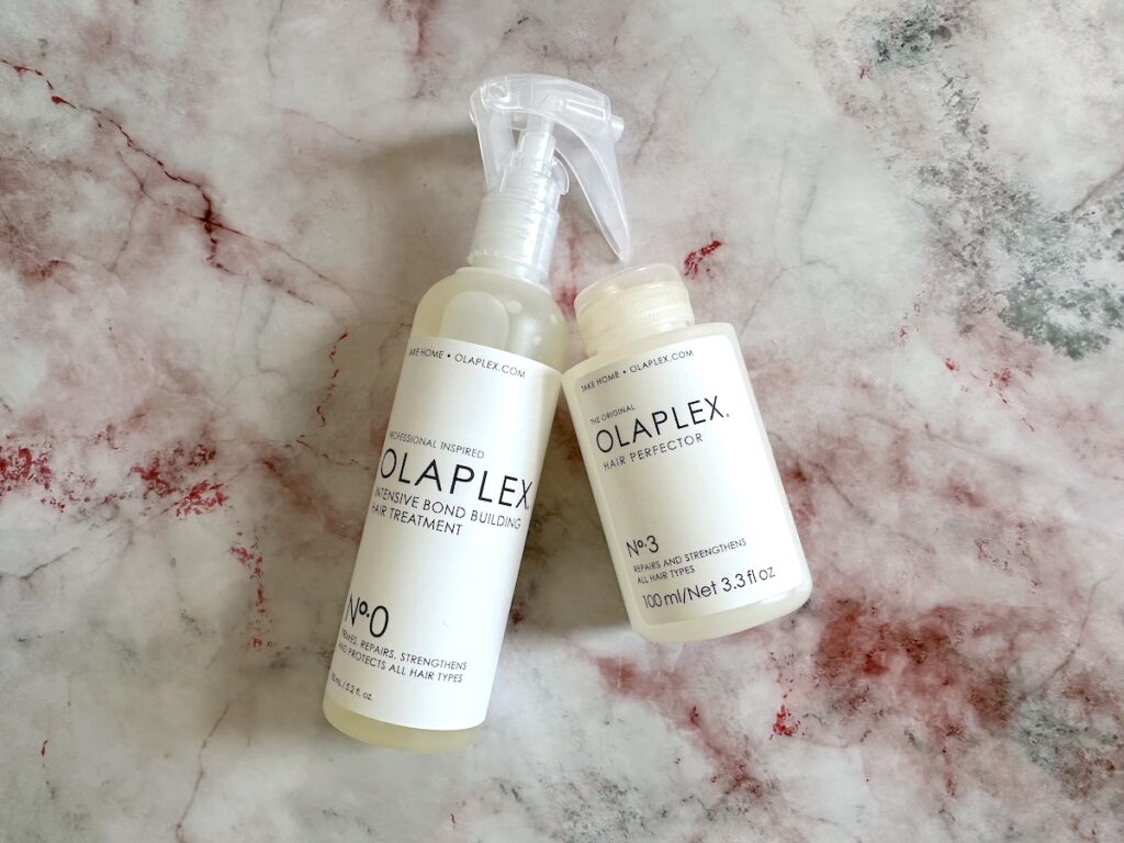 Olaplex No.0 Intensive Bond Building Treatment and Olaplex No.3 Hair Perfector flatlay.