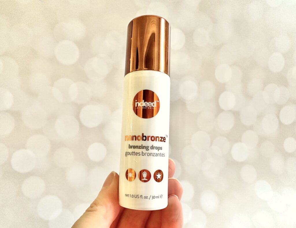 Indeed Labs Nanobronze Bronzing Drops, handheld.