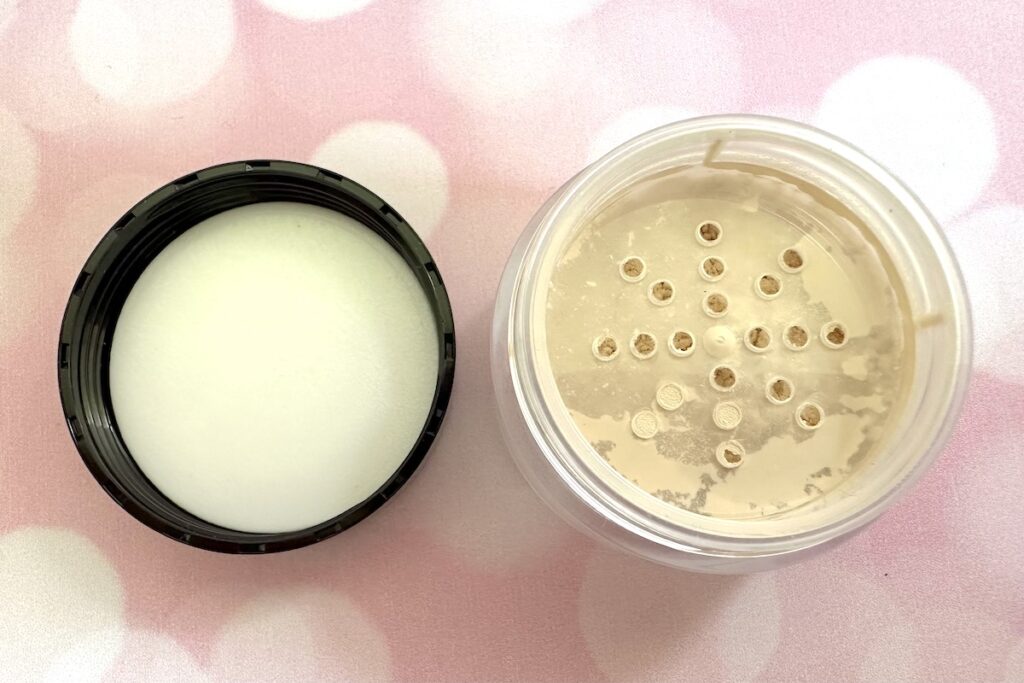 Laura Mercier Translucent Loose Setting Powder in the shade Translucent, open jar and lid.