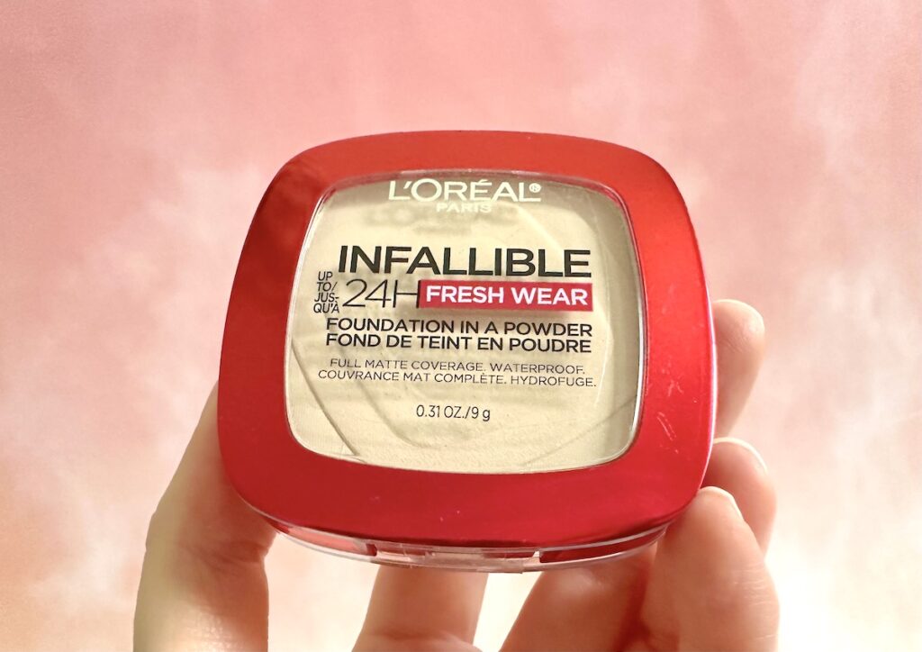 L'Oreal Infallible Up to 24H Fresh Wear Foundation in a Powder in the shade True Beige, handheld.