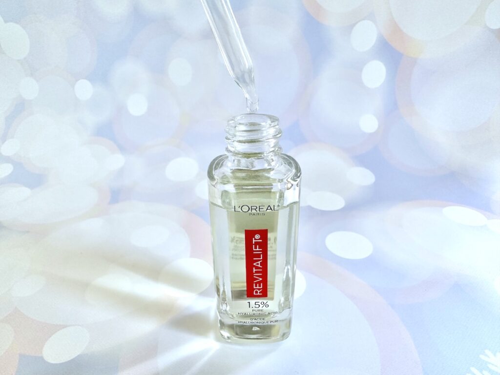 L'Oréal Revitalift 1.5% Pure Hyaluronic Acid Serum, open bottle with dropper applicator.