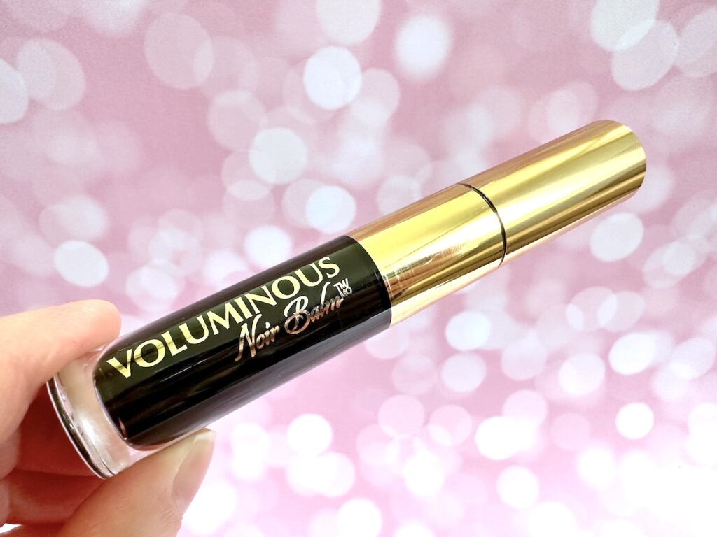 L’Oréal Paris Voluminous Noir Balm Washable Mascara in the shade Black, handheld.