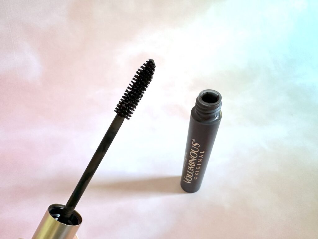 L'Oreal Voluminous Original Mascara in the shade Black Brown, open tube with mascara wand.