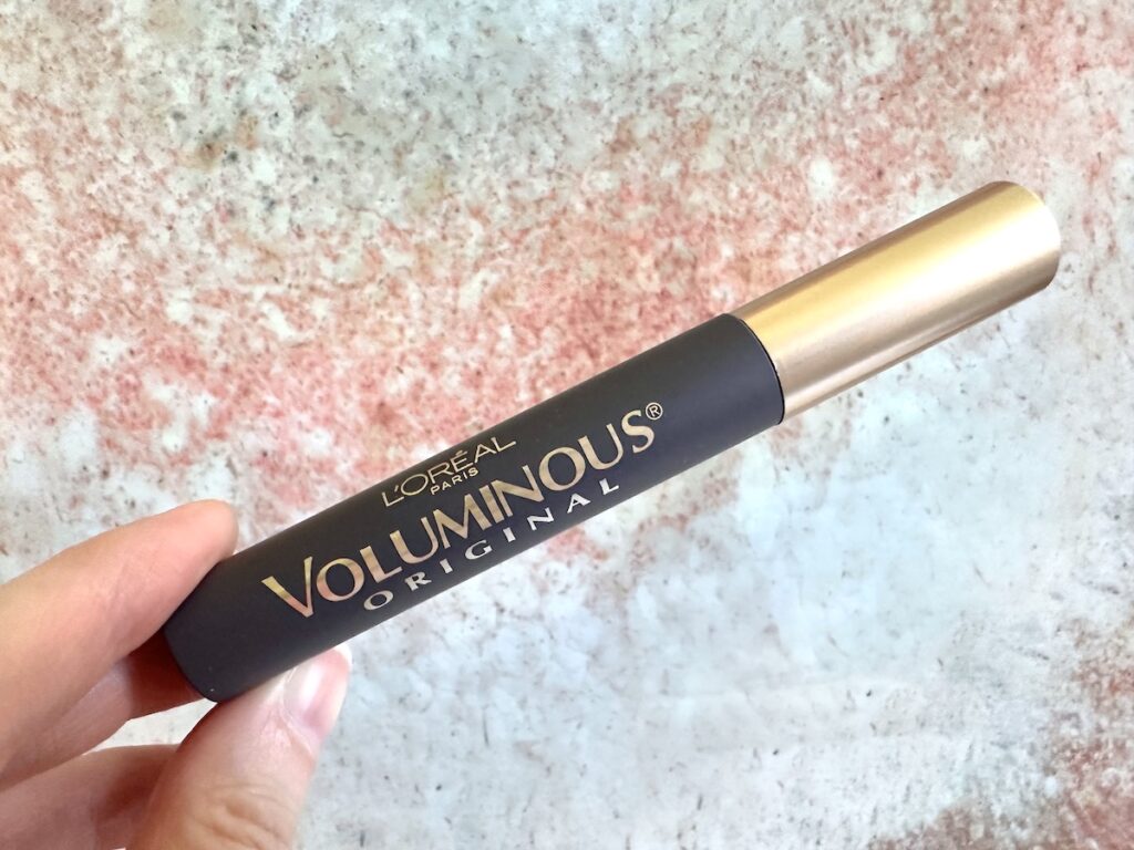 L'Oreal Voluminous Original Washable Mascara in the shade Black Brown, handheld.