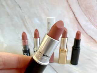 MAC Velvet Teddy Matte Lipstick handheld in front of dupes from NYX, Maybelline, Rimmel London, L'Oreal and Wet n Wild.