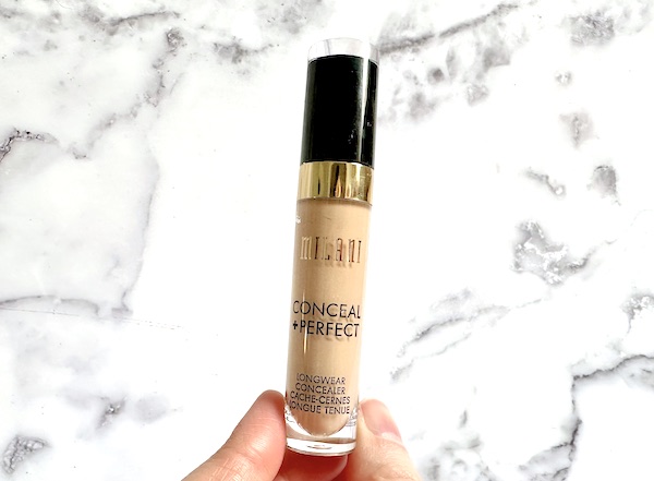 Milani Conceal + Perfect Longwear Concealer, handheld.