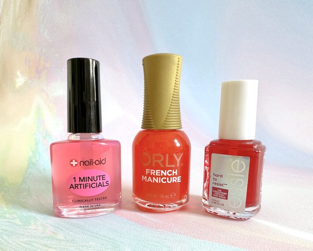 Nail Aid 1 Minute Artificials, Orly French Manicure in the shade Bare Rose, and Essie Hard To Resist Nail Strengthener Glow & Shine.