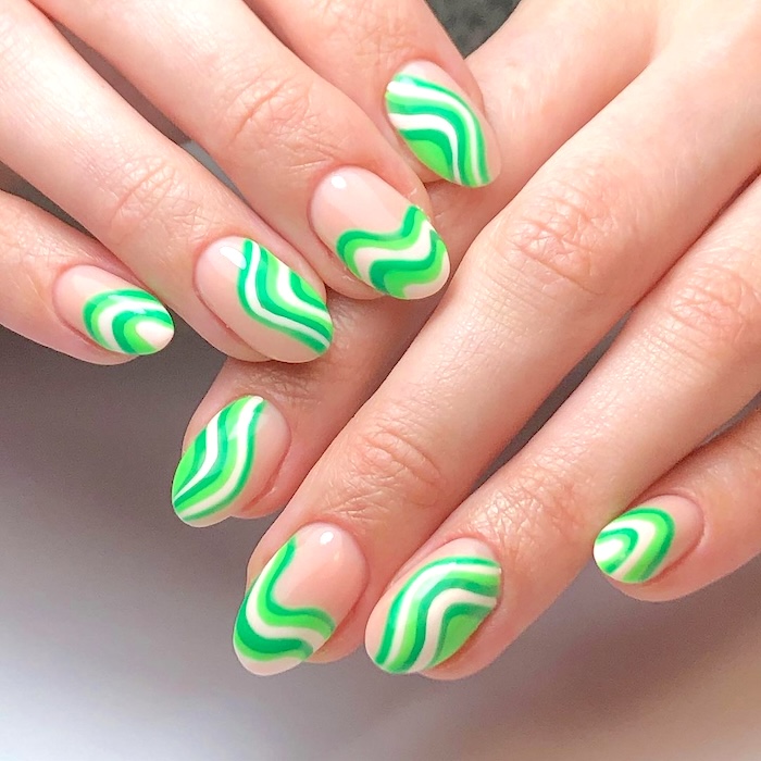 Neon green swirl nails.