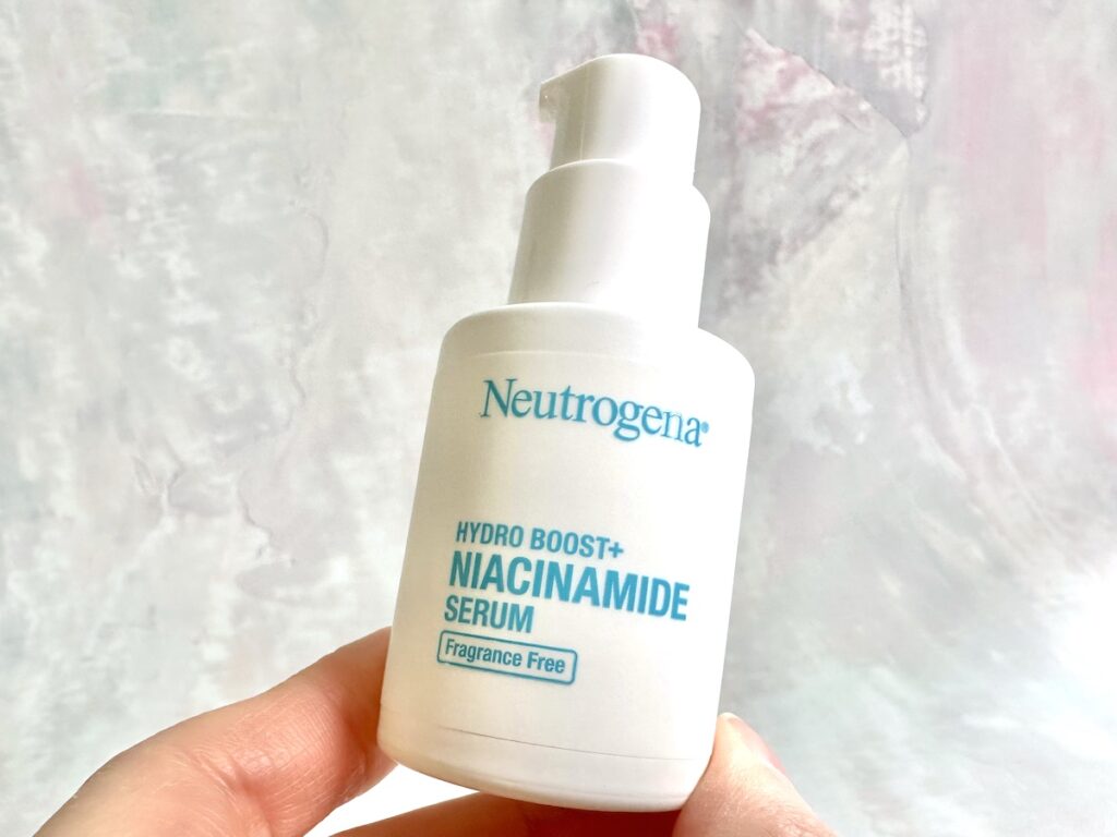 Neutrogena Hydro Boost+ Niacinamide Serum, handheld.