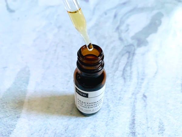 NIOD Fractionated Eye Contour Concentrate serum opened with dropper