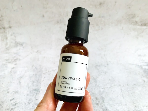 NIOD Survival 0 Antioxidant Serum hand held