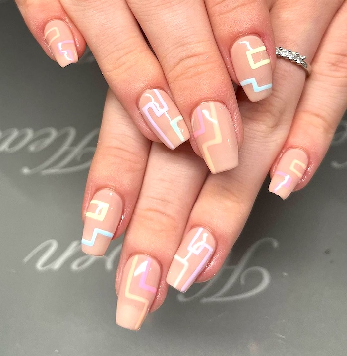 Nude abstract spring nails.