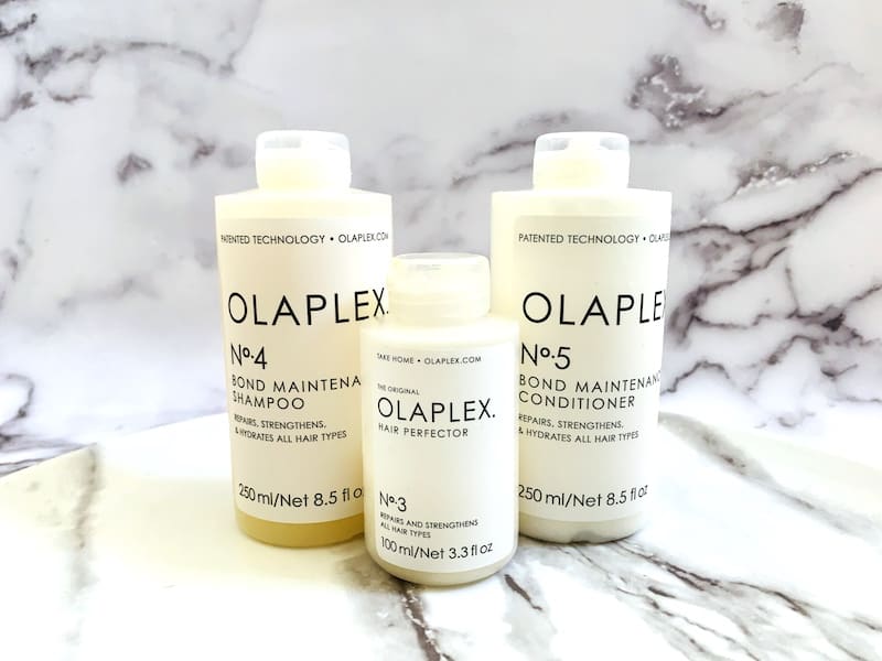 Olaplex Bond Maintenance Shampoo, Conditioner, and Hair Perfector.