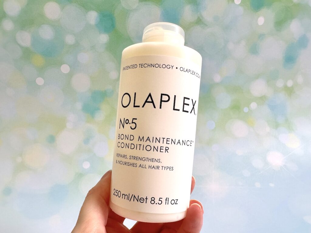 Olaplex No.5 Bond Maintenance Conditioner, handheld.