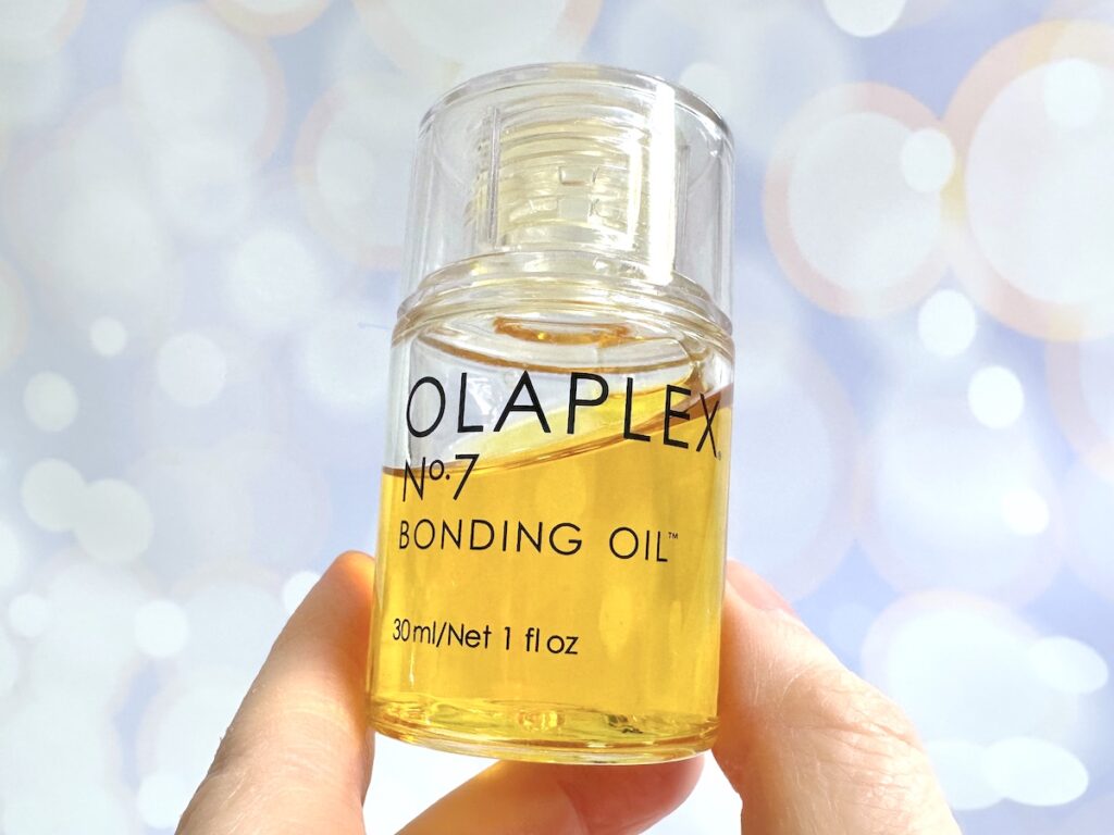 Olaplex No.7 Bonding Oil, handheld.