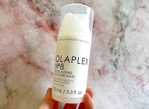 Olaplex No.8 Bond Intense Moisture Mask handheld.