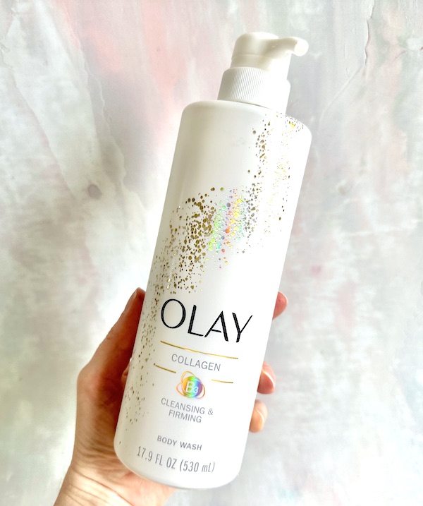 Olay Firming Body Wash with Vitamin B3 and Collagen, handheld.