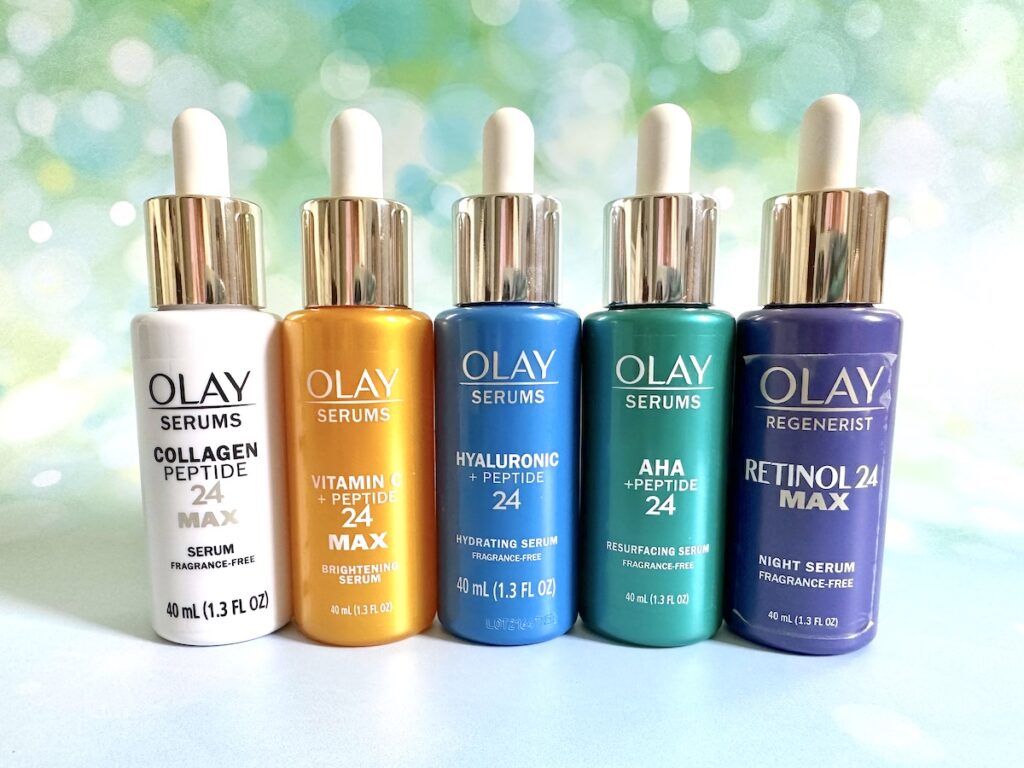 Best Olay Products for 40s: 5 Olay Regenerist serums side by side: Collagen Peptide 24 MAX, Vitamin C + Peptide 24 MAX, Hyaluronic + Peptide 24, AHA + Peptide 24, and Retinol 24 MAX.