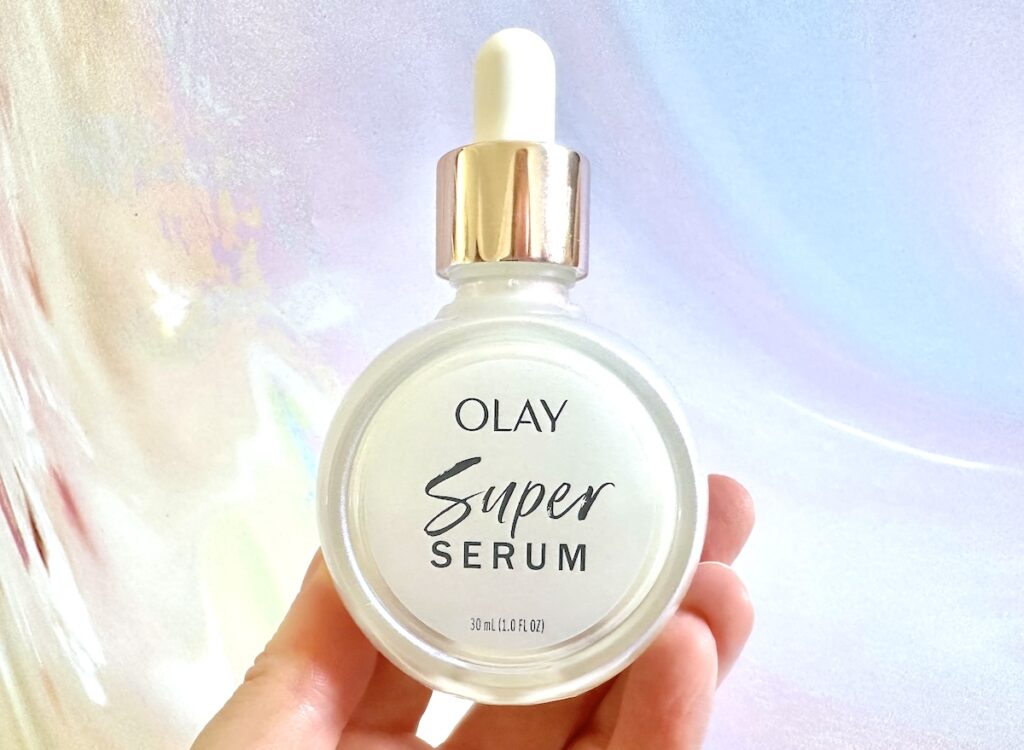 Olay Super Serum, handheld.