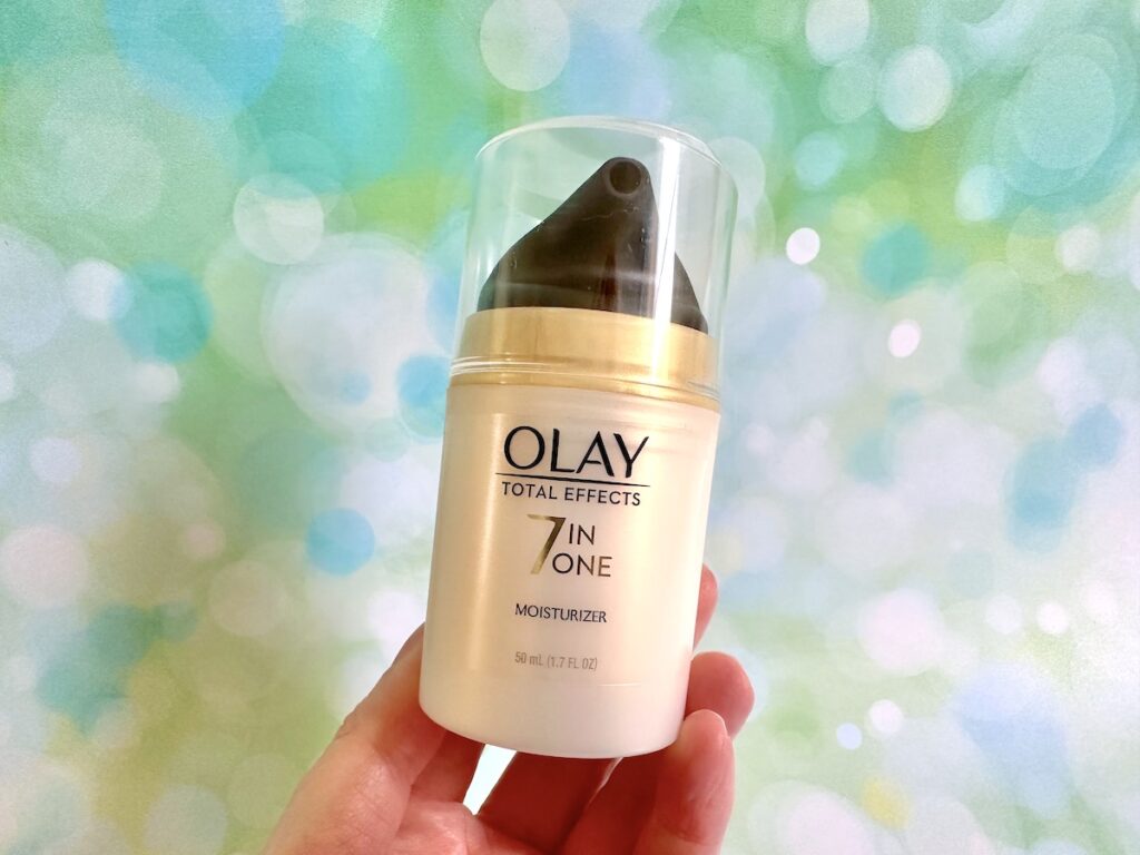 Olay Total Effects Face Moisturizer, handheld.