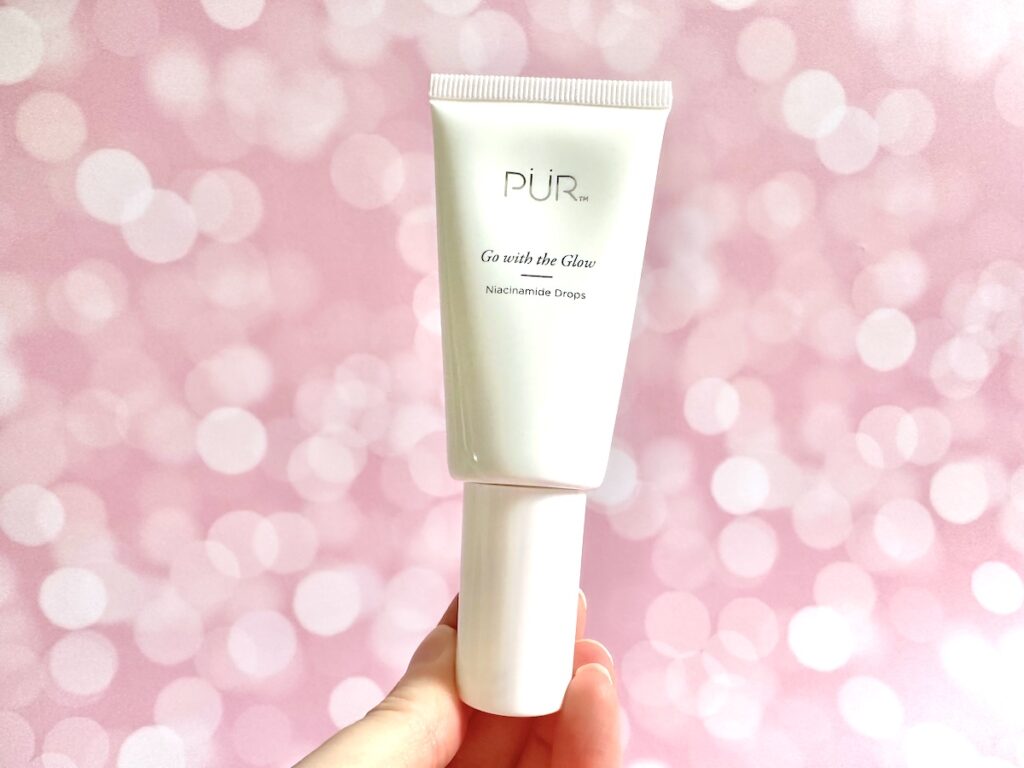 PUR Go with the Glow Niacinamide Drops, handheld.