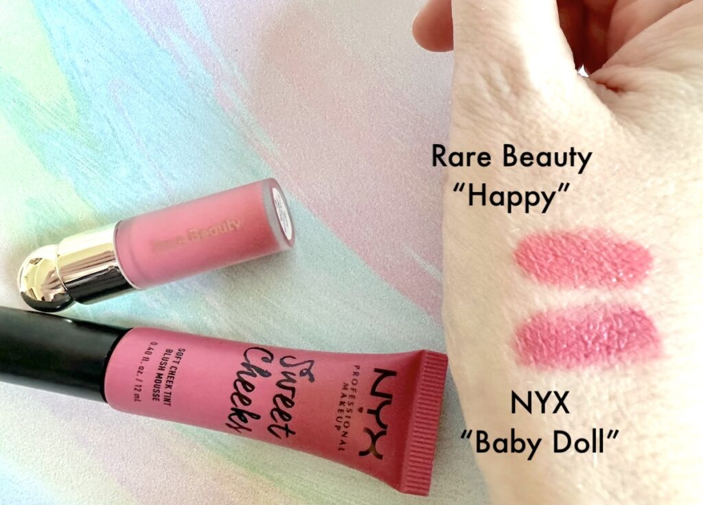 Rare Beauty Soft Pinch Liquid Blush in the shade Happy and NYX Sweet Cheeks Soft Cheek Tint Blush in the shade Baby Doll, sampled on hand, blended.