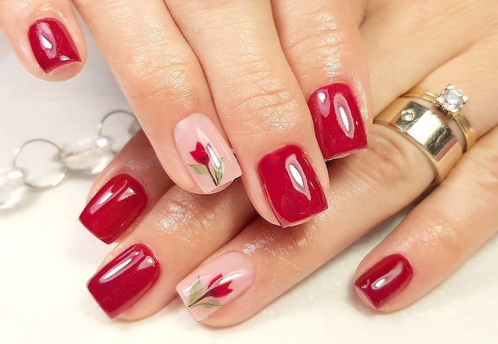 Short red tulip nails.