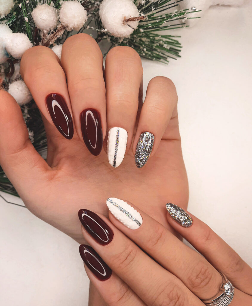 Red, white and silver winter nails.