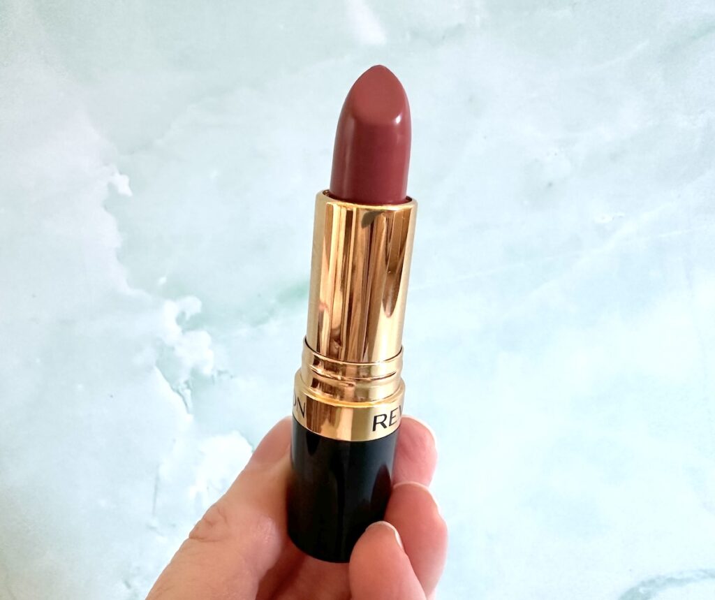 Revlon Super Lustrous Lipstick in Desert Escape, handheld.