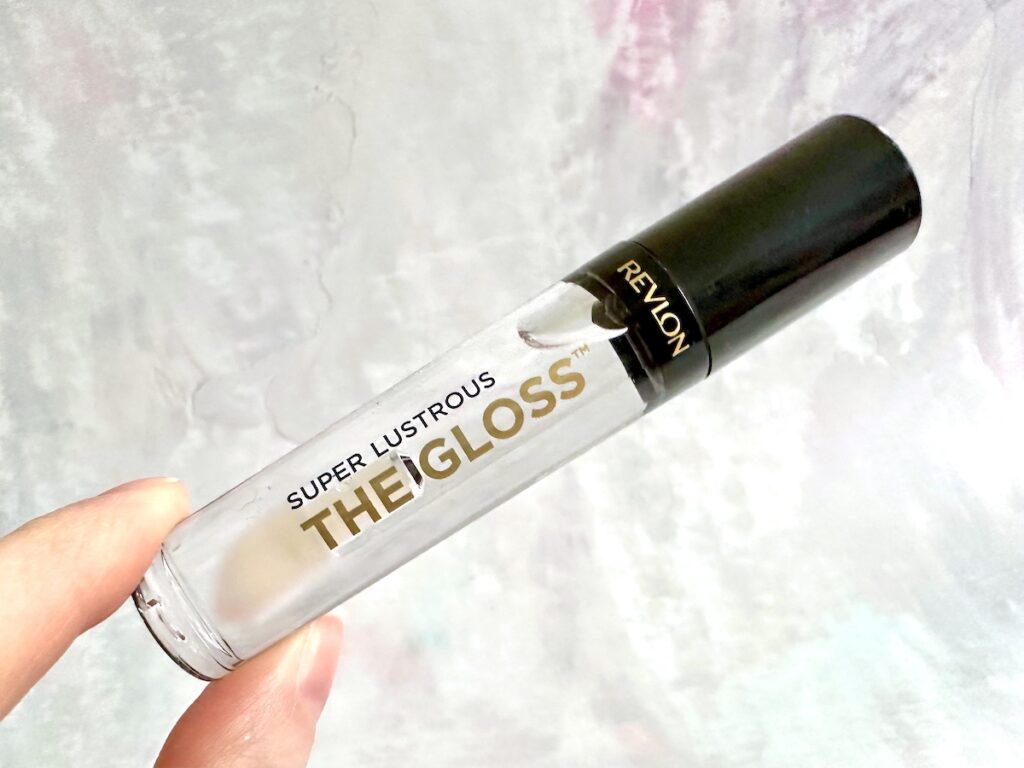 Revlon Super Lustrous The Gloss in the shade Crystal Clear, handheld.