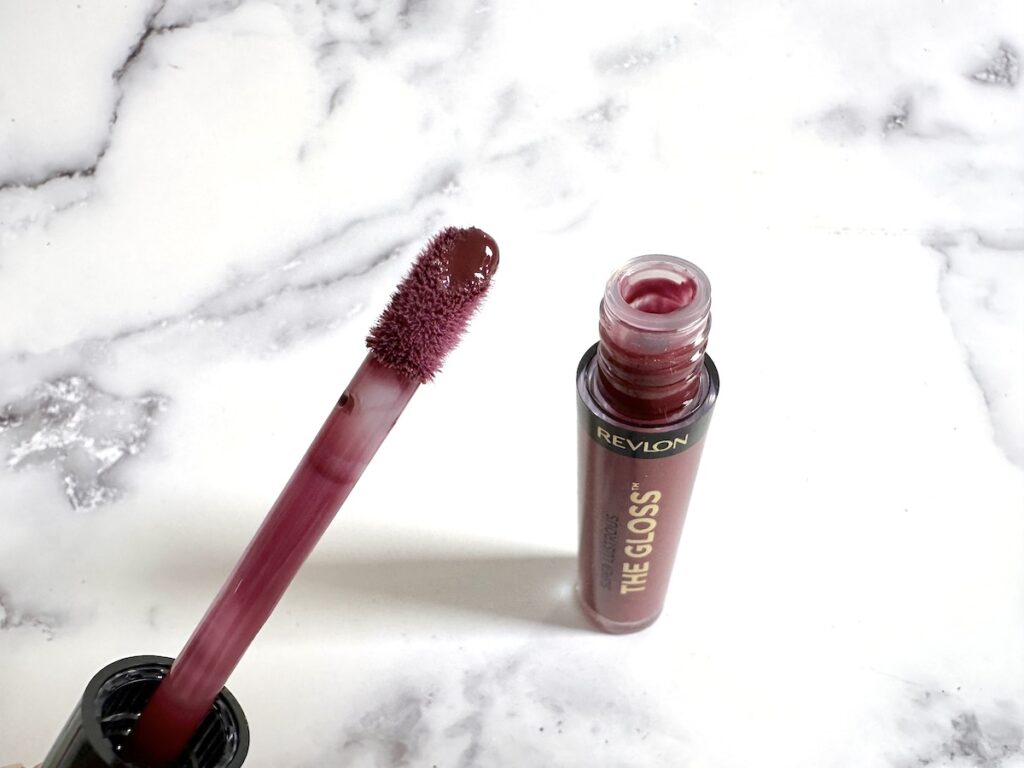 Revlon Super Lustrous The Gloss in Black Cherry, open tube with doe foot applicator.