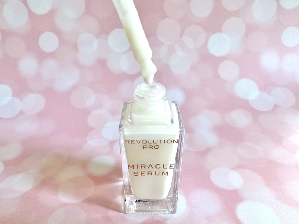 Revolution Pro Miracle Serum, open bottle with dropper applicator.