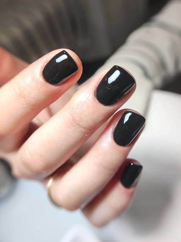 Short black nails manicure.