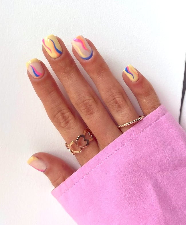 Short multi-colored nails.