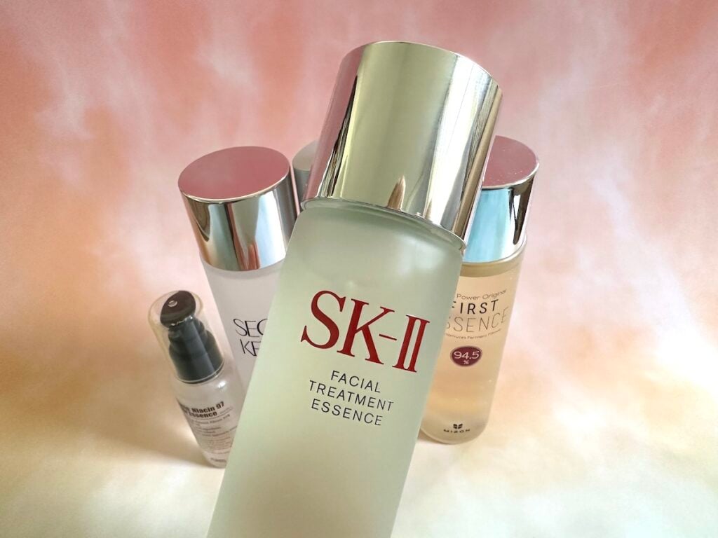 SK-II Facial Treatment Essence in front of drugstore dupes from Purito, Secret Key, Mizon and Missha.