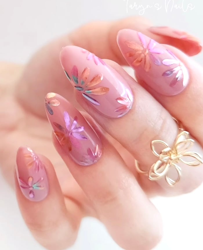 Chrome pink spring fllower nails with golden flower ring.