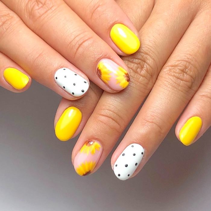 Yellow sunflower nails mixed with white polka-dot nails.