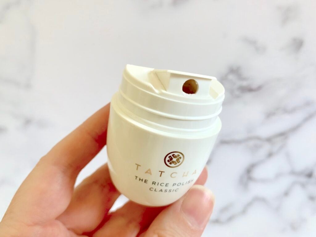 Tatcha The Rice Polish handheld and open.