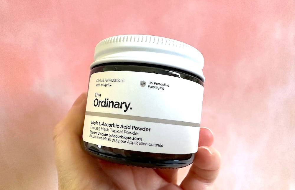 The Ordinary 100% L-Ascorbic Acid Powder, handheld.