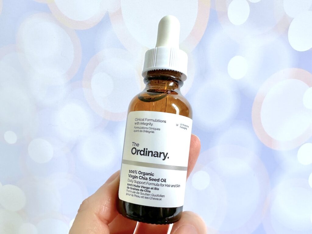 The Ordinary 100% Organic Virgin Chia Seed Oil, handheld.