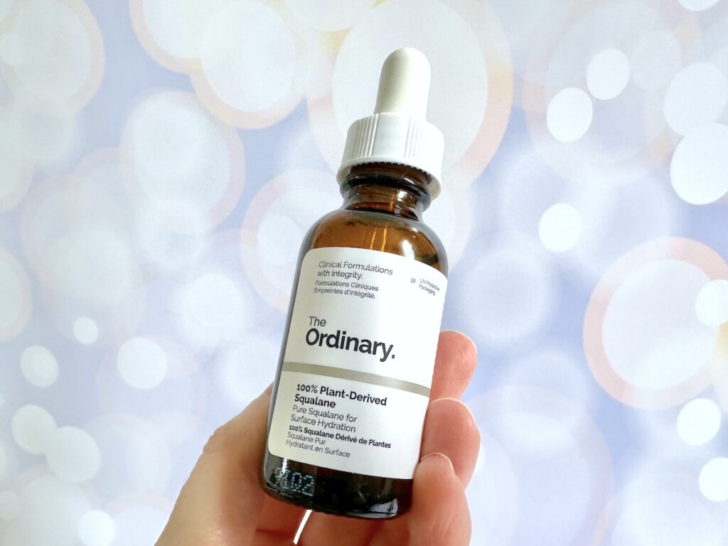 The Ordinary 100% Plant-Derived Squalane, handheld.