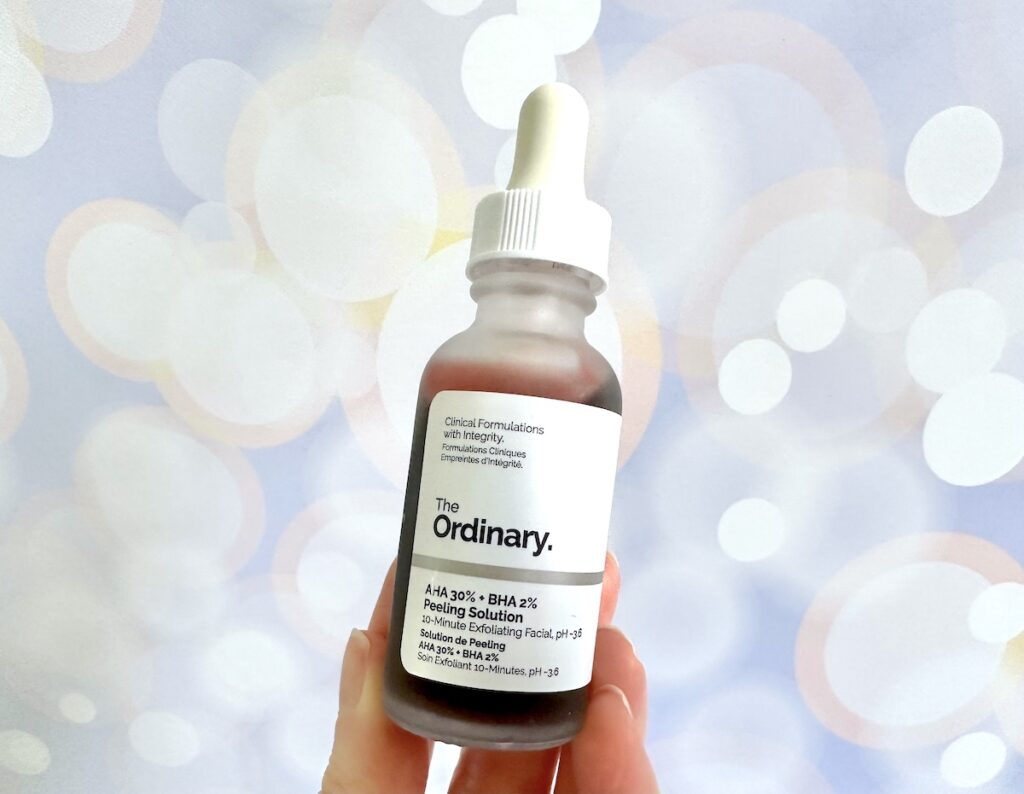 The Ordinary AHA 30% + BHA 2% Peeling Solution, handheld.