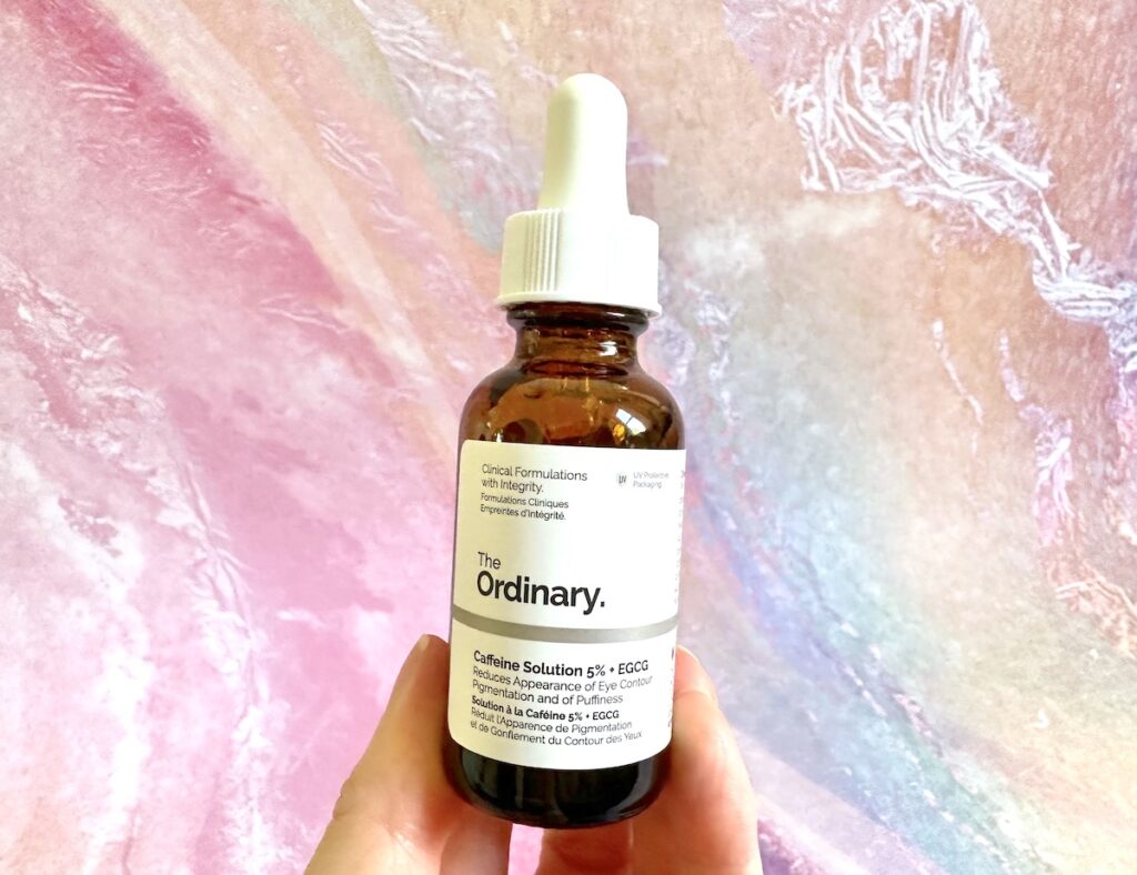 The Ordinary Caffeine Solution 5% + EGCG, handheld.