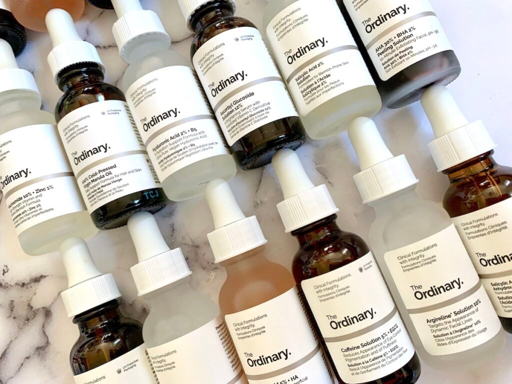 The Ordinary Conflicts: flatlay of The Ordinary serums on an angle.